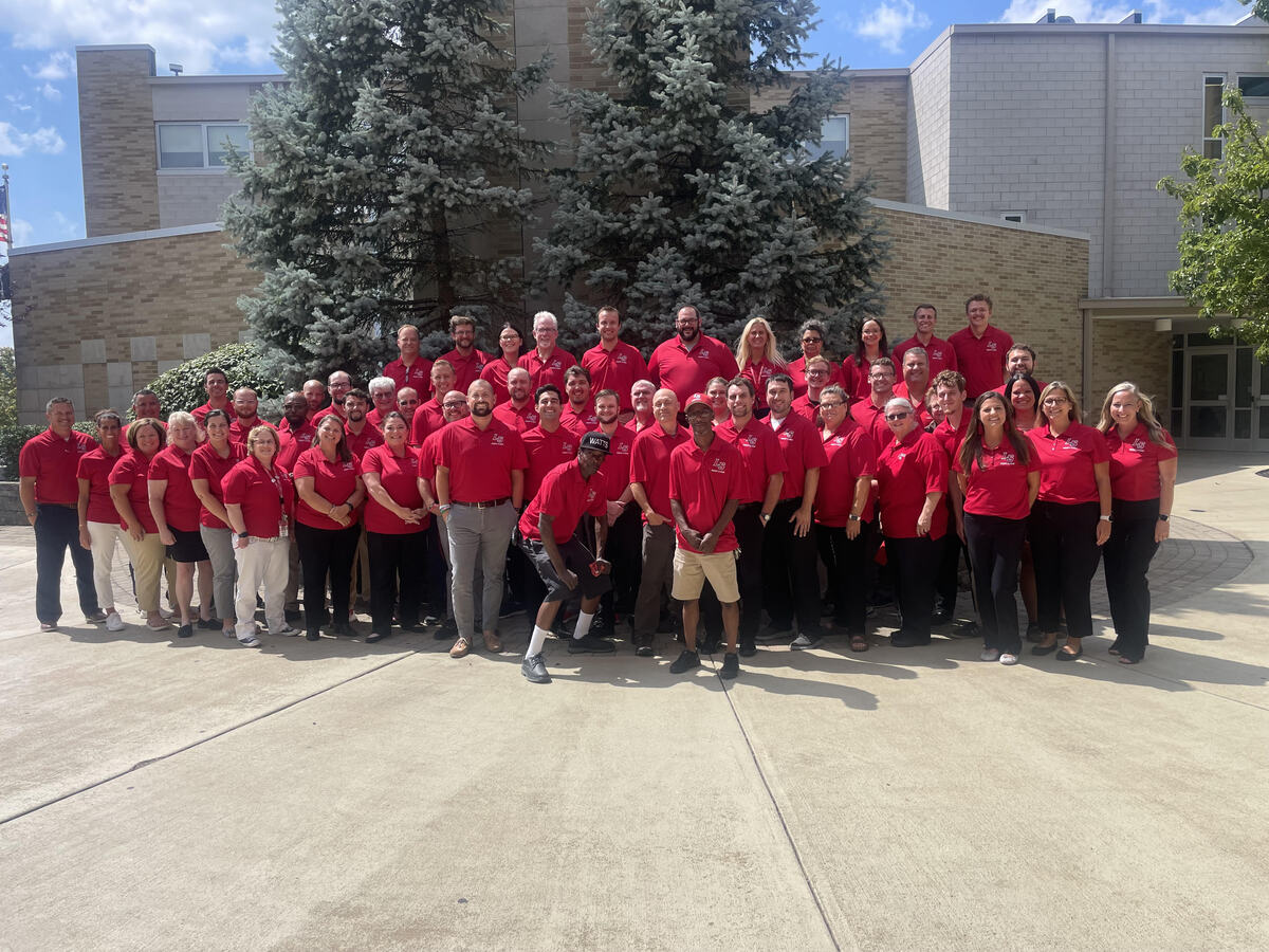 La Salle staff members in courtyard